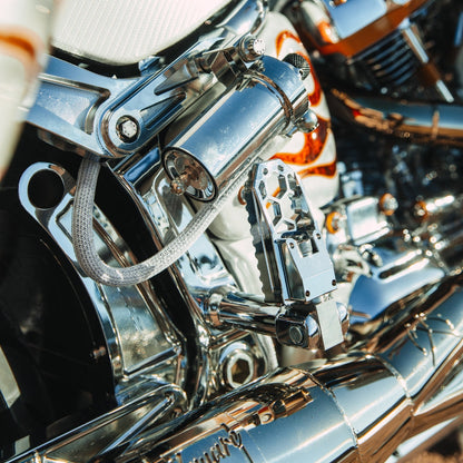OG HoneyComp V3 Foot Pegs installed on a 2024 Softail Low Rider ST FXLRST