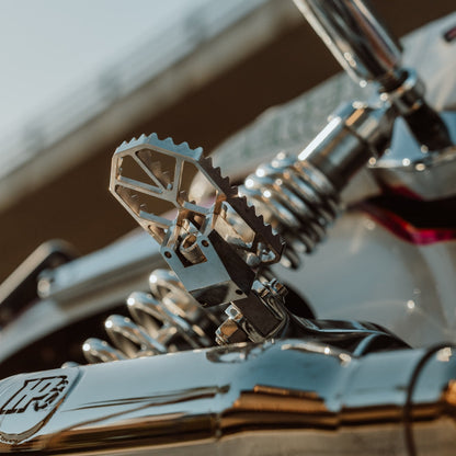 OG Moto X Foot Pegs installed on a Dyna